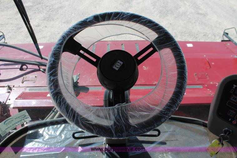 image for item H5859 2011 MacDon M205 self-propelled windrower