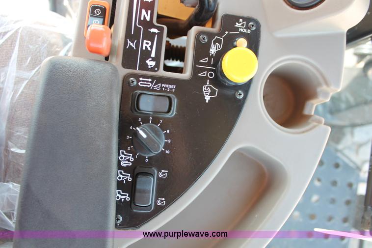 image for item H5859 2011 MacDon M205 self-propelled windrower