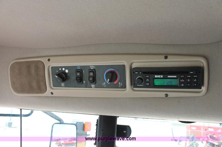 image for item H5859 2011 MacDon M205 self-propelled windrower