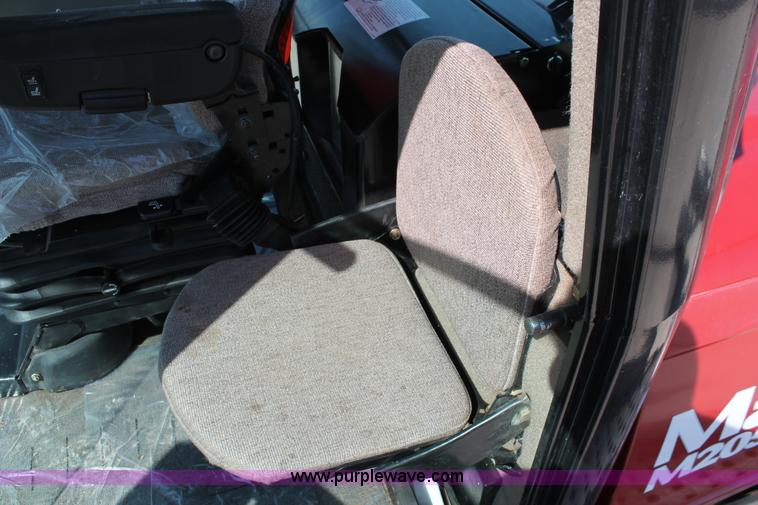 image for item H5859 2011 MacDon M205 self-propelled windrower