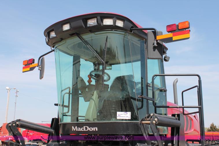 image for item H5859 2011 MacDon M205 self-propelled windrower