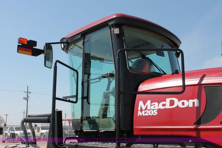image for item H5859 2011 MacDon M205 self-propelled windrower