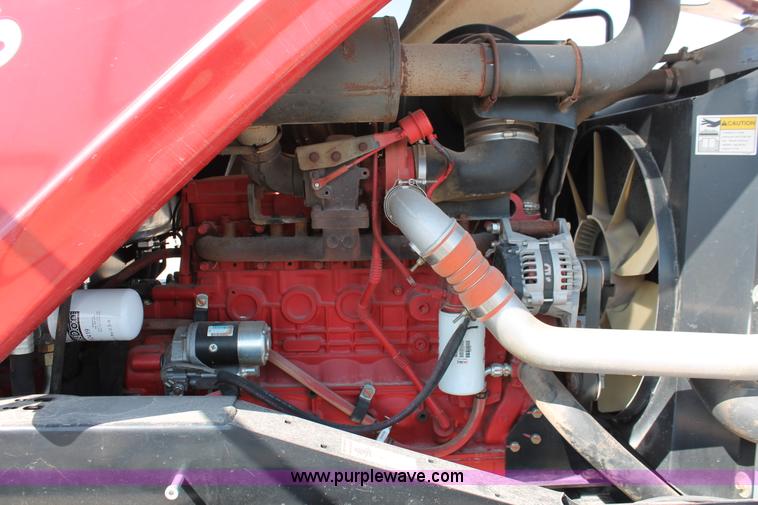 image for item H5859 2011 MacDon M205 self-propelled windrower