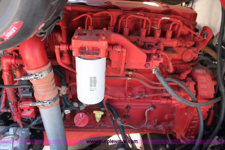 image for item H5859 2011 MacDon M205 self-propelled windrower