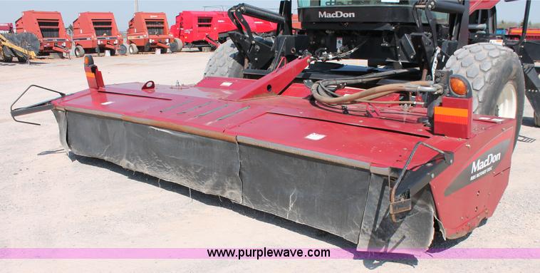 image for item H5859 2011 MacDon M205 self-propelled windrower