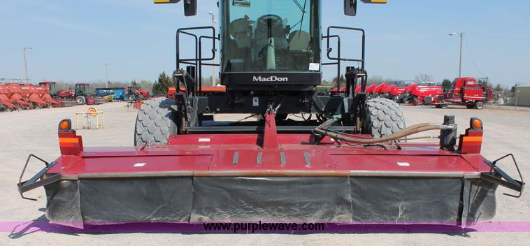 image for item H5859 2011 MacDon M205 self-propelled windrower