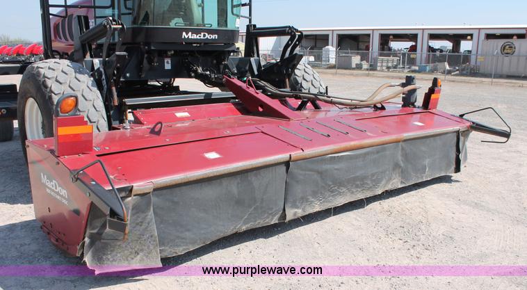 image for item H5859 2011 MacDon M205 self-propelled windrower