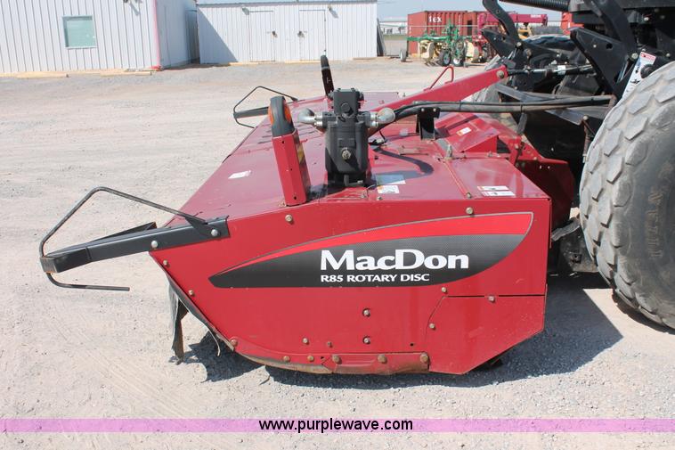 image for item H5859 2011 MacDon M205 self-propelled windrower