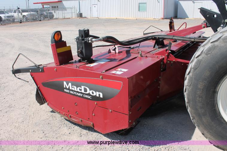 image for item H5859 2011 MacDon M205 self-propelled windrower