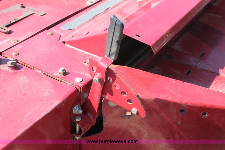 image for item H5859 2011 MacDon M205 self-propelled windrower