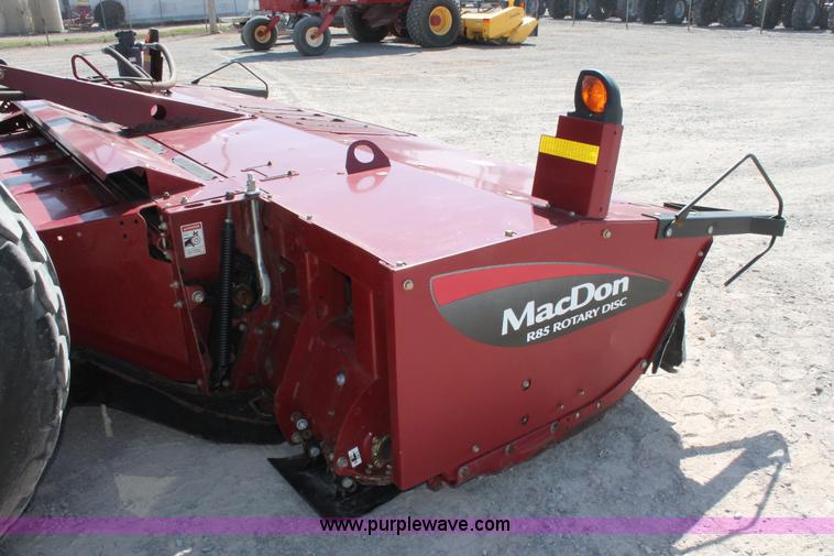 image for item H5859 2011 MacDon M205 self-propelled windrower