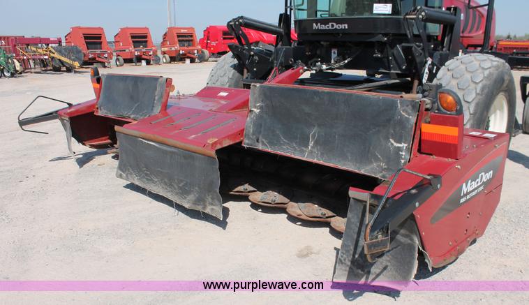 image for item H5859 2011 MacDon M205 self-propelled windrower