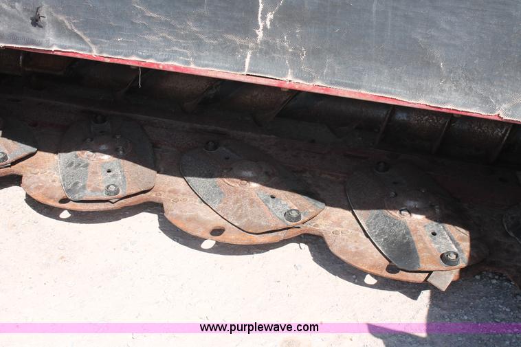 image for item H5859 2011 MacDon M205 self-propelled windrower