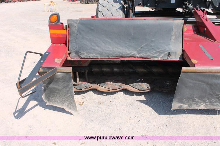 image for item H5859 2011 MacDon M205 self-propelled windrower