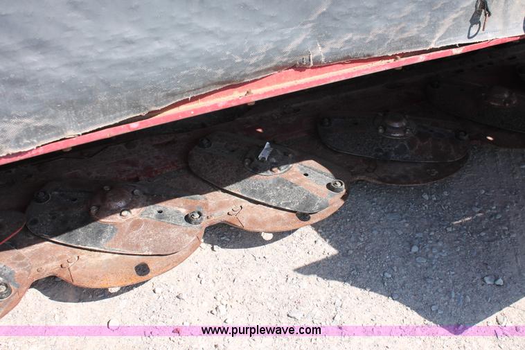 image for item H5859 2011 MacDon M205 self-propelled windrower