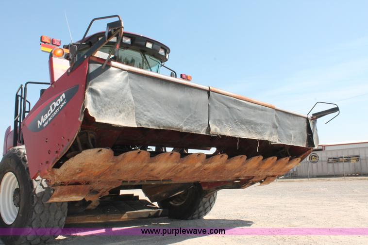 image for item H5859 2011 MacDon M205 self-propelled windrower