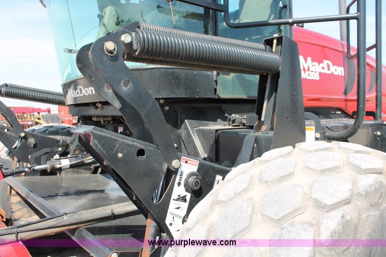 image for item H5859 2011 MacDon M205 self-propelled windrower