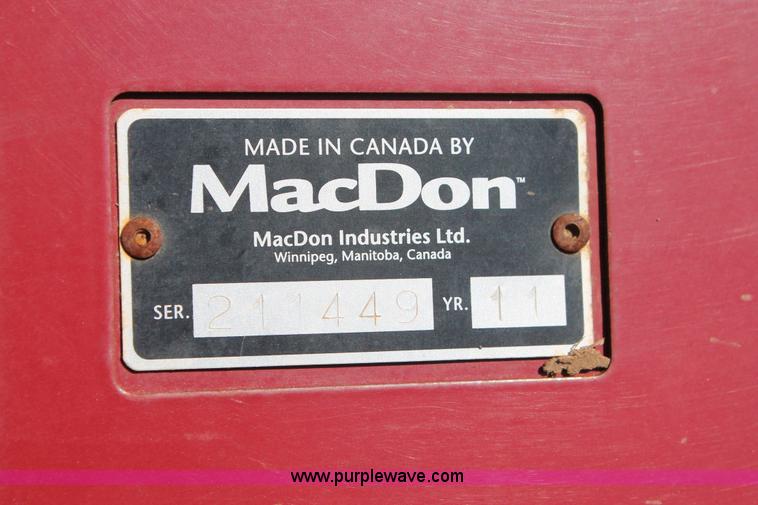 image for item H5859 2011 MacDon M205 self-propelled windrower