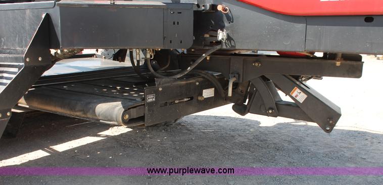 image for item H5859 2011 MacDon M205 self-propelled windrower