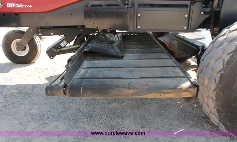 image for item H5859 2011 MacDon M205 self-propelled windrower