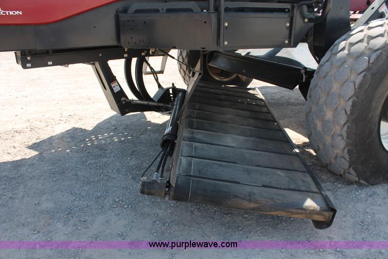 image for item H5859 2011 MacDon M205 self-propelled windrower