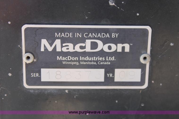 image for item H5859 2011 MacDon M205 self-propelled windrower