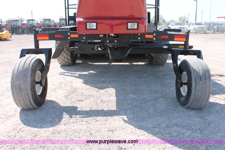 image for item H5859 2011 MacDon M205 self-propelled windrower