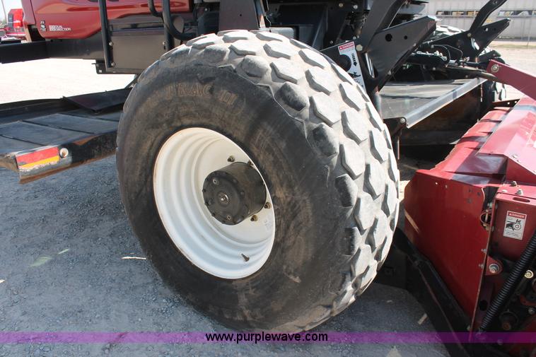 image for item H5859 2011 MacDon M205 self-propelled windrower