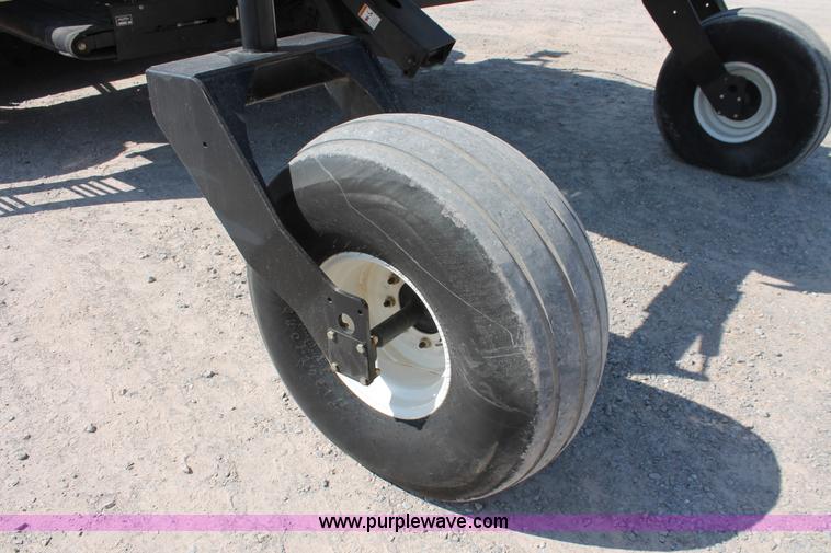 image for item H5859 2011 MacDon M205 self-propelled windrower