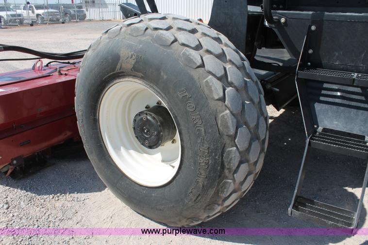 image for item H5859 2011 MacDon M205 self-propelled windrower