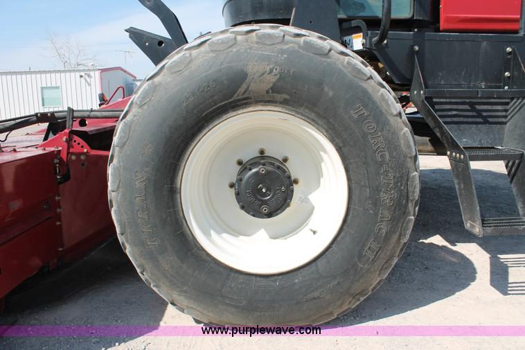 image for item H5859 2011 MacDon M205 self-propelled windrower