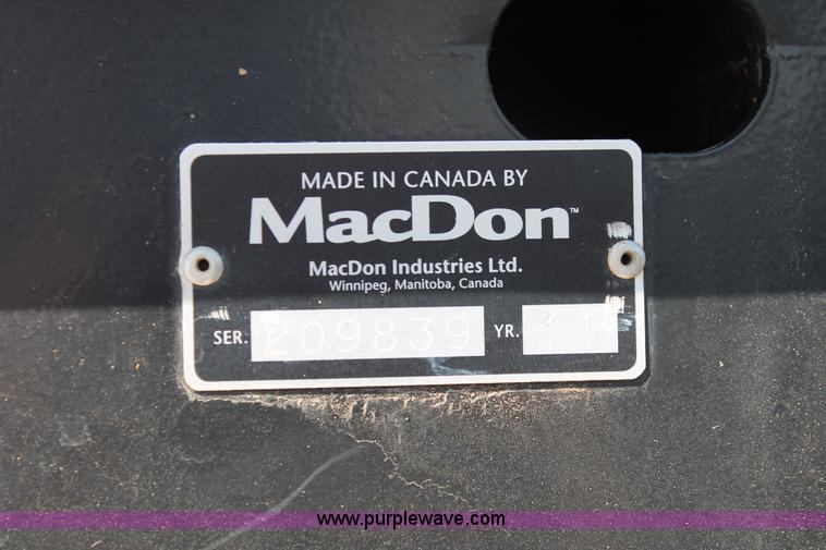 image for item H5859 2011 MacDon M205 self-propelled windrower