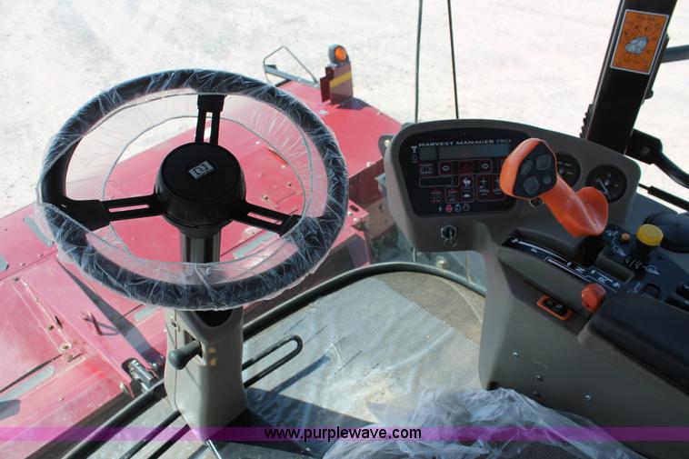 image for item H5860 2011 MacDon M205 self-propelled windrower