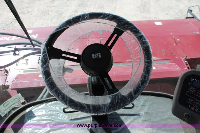 image for item H5860 2011 MacDon M205 self-propelled windrower