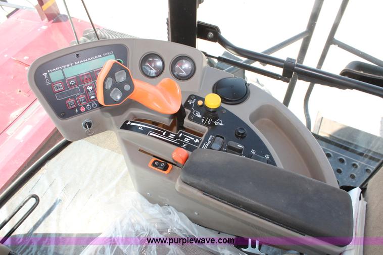 image for item H5860 2011 MacDon M205 self-propelled windrower