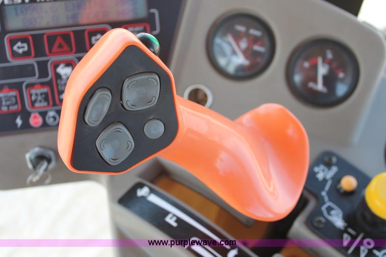 image for item H5860 2011 MacDon M205 self-propelled windrower