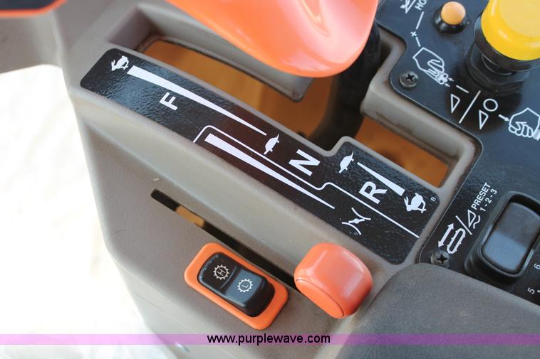 image for item H5860 2011 MacDon M205 self-propelled windrower