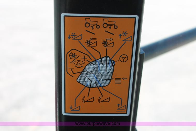 image for item H5860 2011 MacDon M205 self-propelled windrower