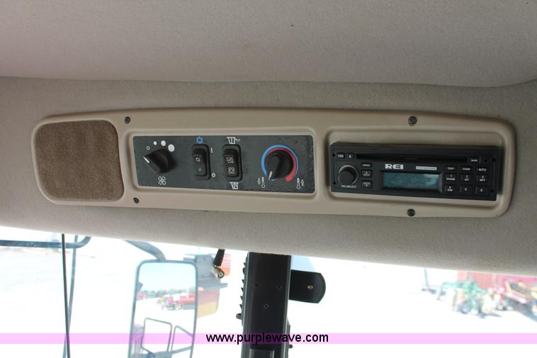 image for item H5860 2011 MacDon M205 self-propelled windrower