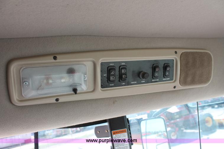 image for item H5860 2011 MacDon M205 self-propelled windrower