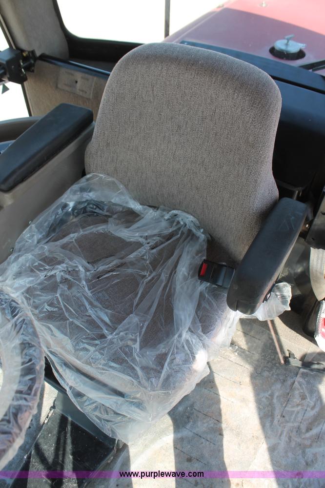 image for item H5860 2011 MacDon M205 self-propelled windrower