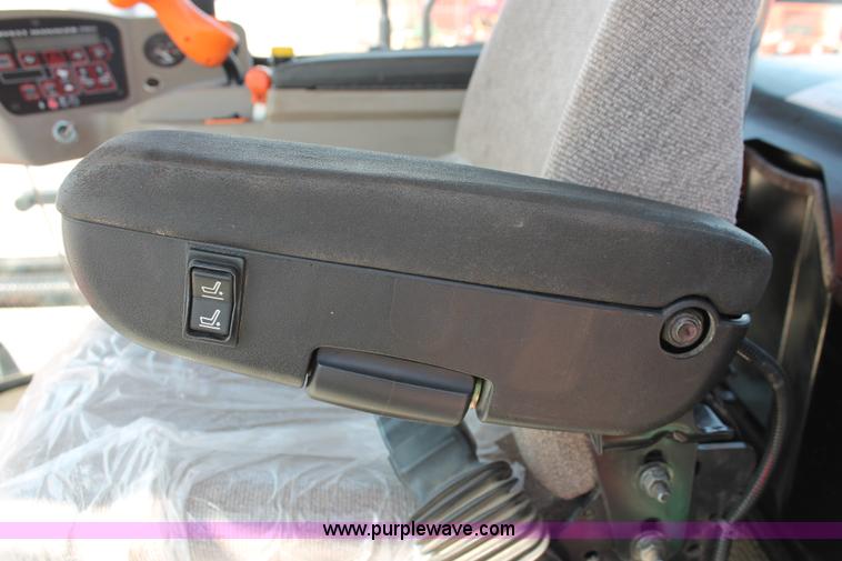 image for item H5860 2011 MacDon M205 self-propelled windrower