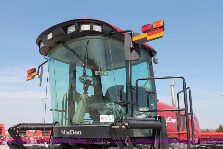 image for item H5860 2011 MacDon M205 self-propelled windrower