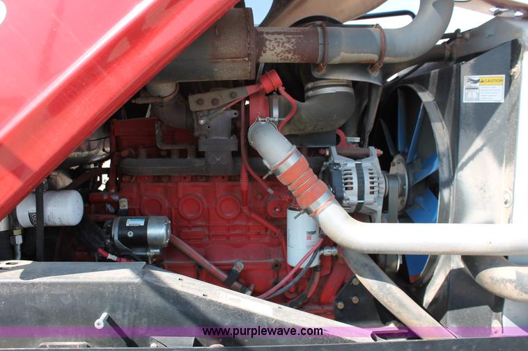 image for item H5860 2011 MacDon M205 self-propelled windrower