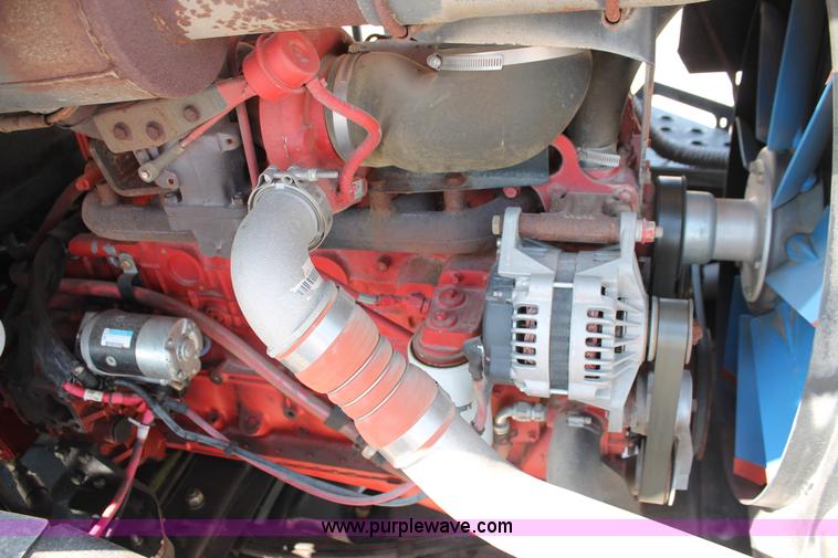 image for item H5860 2011 MacDon M205 self-propelled windrower