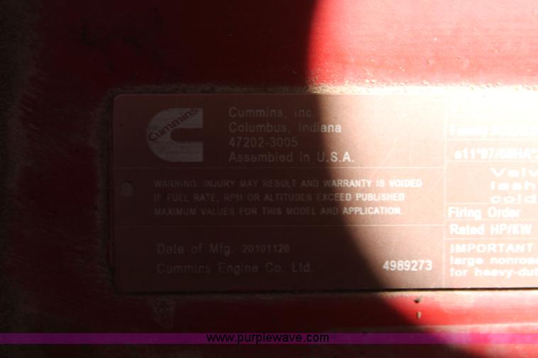 image for item H5860 2011 MacDon M205 self-propelled windrower