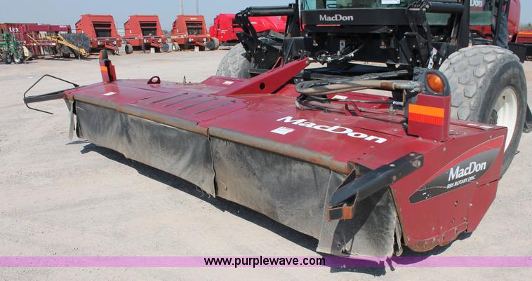 image for item H5860 2011 MacDon M205 self-propelled windrower