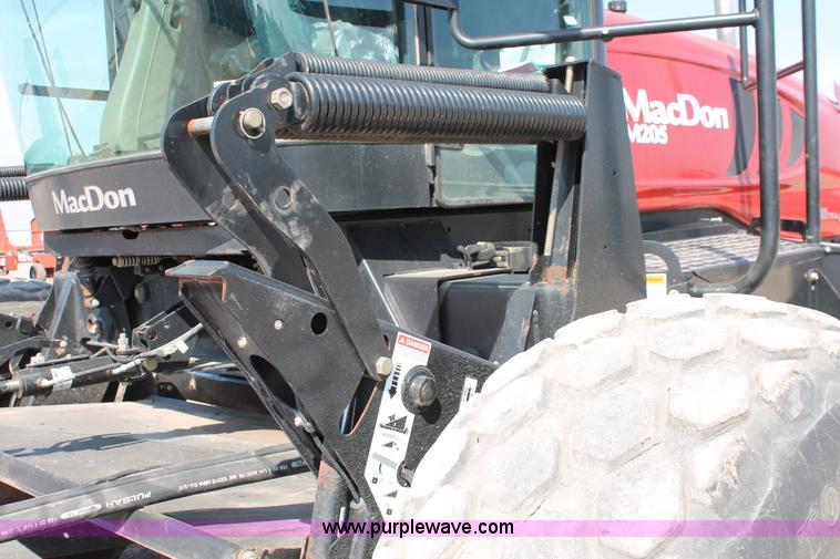 image for item H5860 2011 MacDon M205 self-propelled windrower
