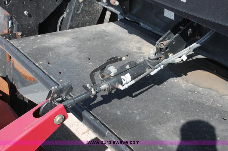 image for item H5860 2011 MacDon M205 self-propelled windrower