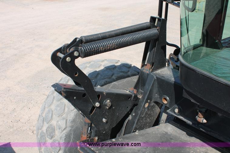 image for item H5860 2011 MacDon M205 self-propelled windrower